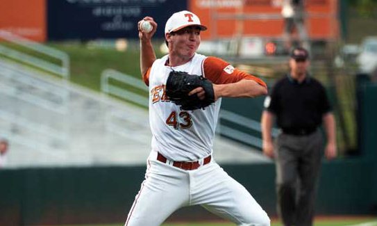 John Curtiss throws to first. Photo: Patrick Meredith/Univ. Of Texas
