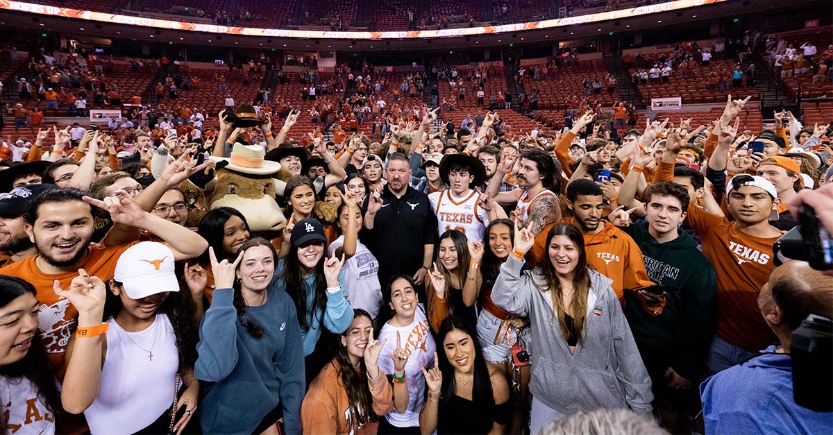 Chris Beard with fans after a game
